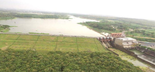 Figure 1. Wlingi Dam and Ricefields (Source: Photo Collection of Perum Jasa Tirta I).