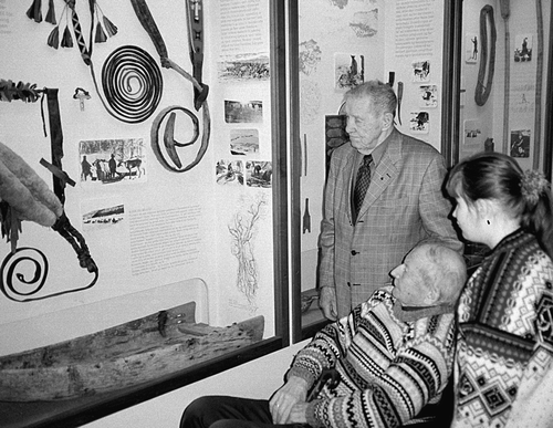 Figure 1. Thomas Renberg, Ørnulv Vorren and Laila Renberg visit the Sami exhibition at Tromsø University Museum. Photograph by Dikka Storm, Tromsø University Museum.