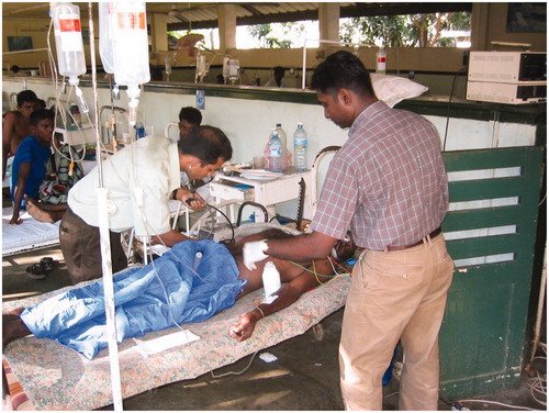Figure 1. A patient with organophosphorus insecticide self-poisoning being cared for in Teaching Hospital Anuradhapura, Sri Lanka. Photograph by Michael Eddleston, 2003. The patient gave informed consent for the use of this photograph.