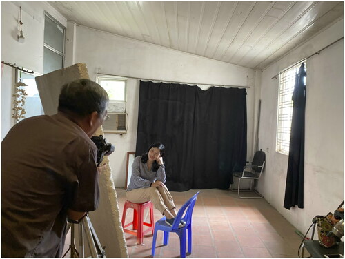 Figure 6 Mr. Nguyễn Minh Nhật photographs Bùi Thu Hoà using all-natural light, the work that gained him recognition as an Occupational Village Artisan. (Photo by Nguyễn Văn Huy)