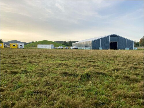 Figure 1 Exterior of the Gjellestad excavation tent with accompanying parking space and barracks. Photo: Joakim Karlsen.