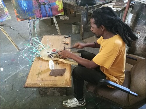 Figure 8. Mussagy Narane ‘Falcão’ Talaquichand (Nampula, 1976), working on a Makonde mask in his studio in Maputo, 2020. Source: Author’s own photograph (27 February 2020), with permission of the artist.