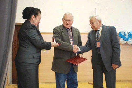 Professor Yu.M. Yevdokimov's presentation with the Freedericksz medal during the Ivanovo International Conference on Lyotropic Liquid Crystals, 2009. Here, Professor N.V. Usoltseva (left) of Ivanovo State University, Professor Yu.M. Yevdokimov (centre) and Professor S.A. Pikin (right) of the Institute of Crystallography of the Russian Academy of Sciences are shown.