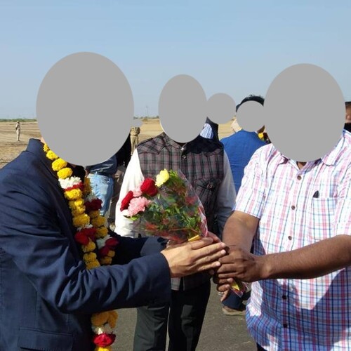 Figure 1. Local property dealer welcoming a Chinese business delegate. This was on the sideline during the visit of a Chinese group to Chandori SIR. Source: The picture is from the official websites of the real estate companies.