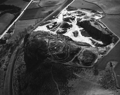 Fig 3 Aerial image from 1960 looking east showing excavations and quarrying in progress with over 50% of the site destroyed. © Historic Environment Scotland 1902264.
