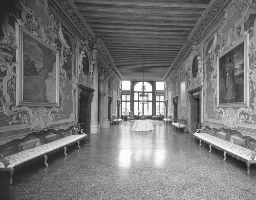 Fig. 3. Interior view of the salon from Ca' Da Mosto in Venice showing the richly decorated seventeenth-century style portego facing the sala on the Grand Canal. The map on the left shows northwest Africa and the Atlantic Ocean. The palace, built in the thirteenth century and the oldest on the Grand Canal, is named after the Venetian explorer Alvise Ca' da Mosto, who travelled the coast of Africa in the mid-fifteenth century under the aegis of Prince Henry of Portugal. (Reproduced with permission from the Scala / Art Resource, New York.)