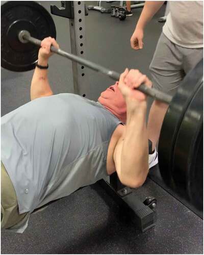 Figure 2. Michael Bench pressing his 5-rep max. Michael felt pride associated with looking good from regular LTPA.