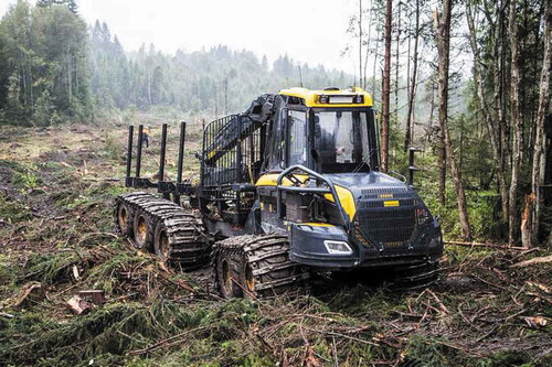 Figure 1. The Ponsse Buffalo 10-wheeled forwarder used in the field test (photo R. Dalen) showing a standard track on the front bogie and a combi-track on the rear bogie. The auxiliary axle is seen behind the rear bogie and has variable axle pressure when in use