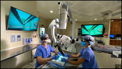 Figure 4. Microsurgery on a nerve tube utilizing high definition monitors, sealed goggles, and anti-fog solution in lieu of standard eye pieces.