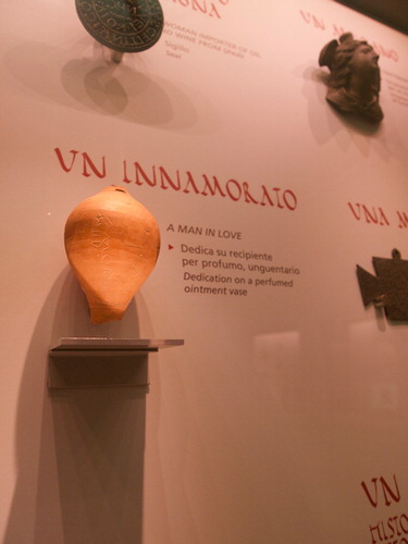Figure 2. An inscribed perfume bottle on display at the Epigraphic Museum in Rome. The label reads ‘A man in love: dedication on a perfumed ointment vase’. Copyright author.