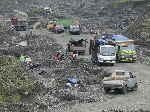 Figure 3 Sand trucks on Mount Merapi.