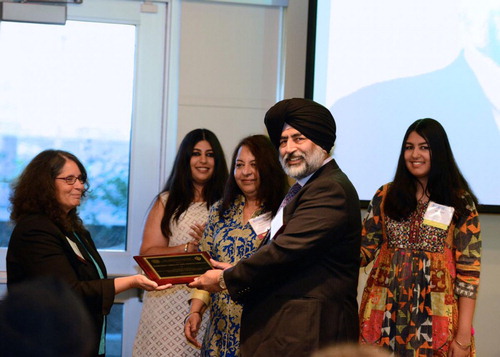 Figure 3. Dean Milagros Peña honoring Dr Harkeerat Singh Dhillon, Deepta Dhillon and their two daughters. © Photographs belong to University of California, Riverside.