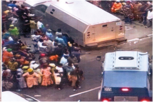 Figure 3. Two bullion-vans in Bola Tinubu’s premises during election periods.Source: https://www.google.com/amp/s/www.vanguardngr.co m/2019/02/money-in-bullion-vans-at-bourdillon-what-is-your-headache-tinubu/amp/.