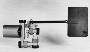 FIG. 21 A later type of swinging [May] cascade impactor for use in the open air. It is provided with a duct before the inlet that decreases losses (CitationMay 1982) [Reprinted from Journal of Aerosol Science, Vol. 13, K. May, A Personal Note on the History of the Cascade Impactor, 37–47, Copyright 1982, with permission from Elsevier].