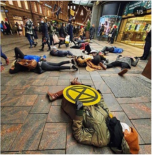 Image 3. Screenshot from social media of a picture posted by the Finnish Extinction Rebellion, showing the Die In in the street.