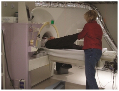 Figure 1 Straight leg raise maneuver during fMRI measurement.