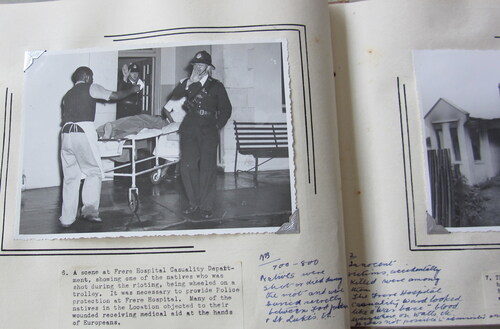 Figure 5. The Dominican photo album with the Daily Dispatch photograph of police preventing entry to Frere Hospital, their own caption and anonymous notes on the massacre. (Source: King Dominican Archives, Johannesburg.)