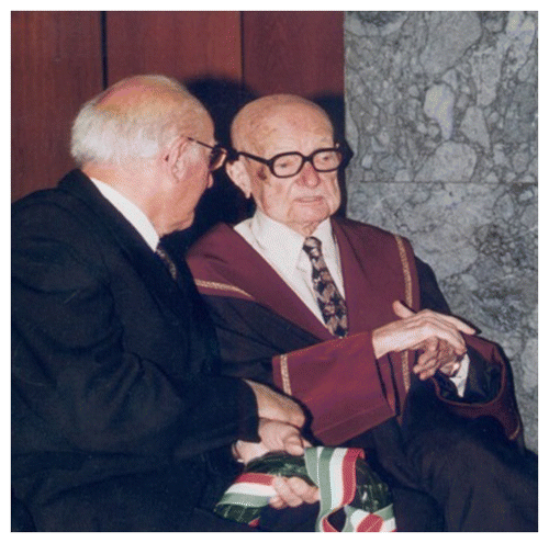Figure 4. Donhoffer talking to one of his colleagues after receiving the Honoris Causa Medal at the University of Pécs in 1996.