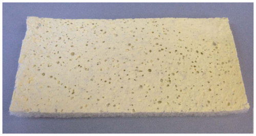 Figure 1 TachoSil fibrin sealant patch with active yellow side facing upwards.
