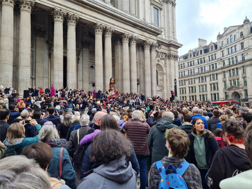 Figure 1. Little Amal – the 3.5 m high puppet child refugee at the centre of “The Walk”, on arrival at St Paul’s Cathedral, London, October 2021 (picture by David Gurnham).