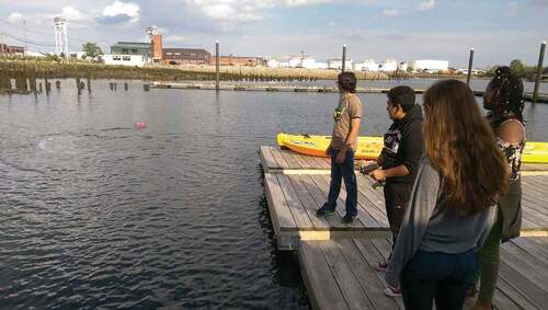 Figure 10. ECO and MIT student Sophia Struckman test RC boats (img: Laura Perovich).
