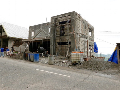 Figure 11. Construction work on new premises for the Rice Terrace Farmers’ Cooperative (RTFC), located on the road south of Banaue towards Lagawe. Photo credit: Dominic Glover.