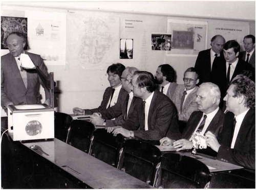 Figure 6. Gottfried Konecny presenting results of the Metric Camera Mission to Lower Saxony Minister for Research, Cassens (right hand side) and the rector of the university in 1985