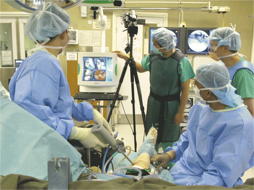 Figure 2. The set-up for NEAT surgery. A shoulder arthroscope and high-speed bone burr mounting a navigation tracker were inserted via two working portals into the tumor cavity. Intra-lesional curettage could be performed under both direct endoscopic visualization and navigation guidance.