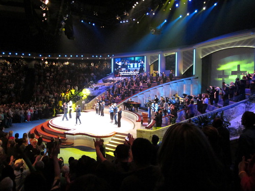 FIG 8 Toned down colours during worship phase with image projection as light source on stage. Photo by the author, 2011.