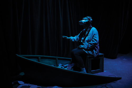 Figure 10. I-ME’s voices say: ‘Psst. Over here. Come to the river, child. Where the stories of the people who lived a moment as the Child of Now are kept. Take a seat.’ the visitor sits in a boat and wears a HMD to experience the Child of Now archive in VR. The archive is represented by a river that contains 1000s of moments from the Child of Now’s life recorded by previous visitors arranged in age order from youngest to oldest. The boat submerges and travels along the riverbed. I-ME says, ‘At the river’s source, the child is just a baby, moments old, but will age like we all do, as life flows into the future. Let’s go a little faster, we have a long life to lead. Hold on!’.