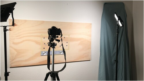 Figure 4. The LED capture set-up with the Sony α7R II on a tripod and two LED panels angled 45° towards the board. External light was blocked out to ensure controlled lighting conditions. © J. Paul Getty Trust