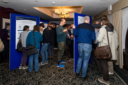 Figure 3. A photo taken during the poster session of the conference.