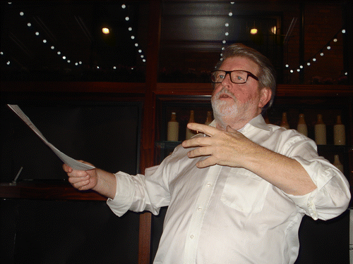 Figure 1. Martin Lynch speaking at a community arts showcase event, Belfast, November 2013. Photo: Liam Harte.