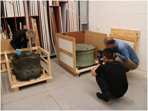 Figure 3. Art Gallery of NSW storage facility, visiting the collection of two large Frog Drums, 2018. The artists were invited to photograph and document the encounter, but not touch or handle the drums. (Photographic documentation of site visit is courtesy of Sheila Pham).