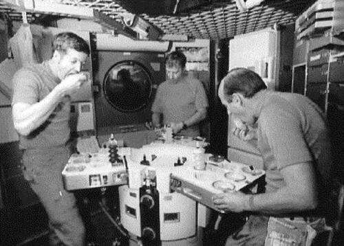 Figure 2. Astronaut eats in spacecraft (Kerwin and Seddon Citation2002).
