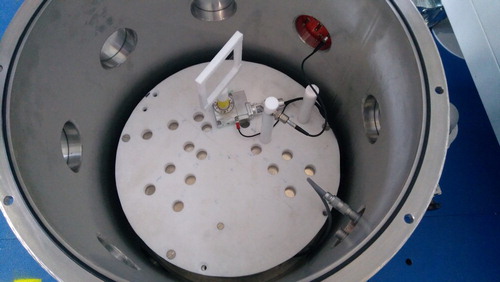 Figure 3. The interior of the NDP sample chamber with standard sample holder and single detector. Radiation shielding is removed for visibility.