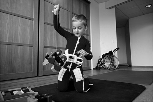 Figure 1. A child wearing the suit while playing