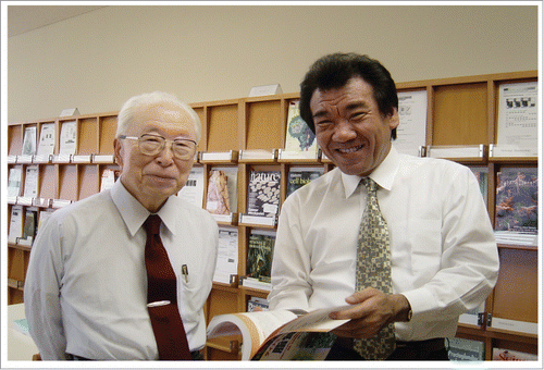 Figure 1. Osamu Hayaishi (left) and Yoshihiro Urade (right) at the library of Osaka Bioscience Institute (OBI), ca. 2005. Osamu Hayaishi was director of OBI from 1993–1998 and also served as the head of the Department of Molecular Behavioral Biology, which focused on elucidating the molecular mechanisms of sleep/wake regulation. In 1998, Yoshihiro Urade assumed the position of Department Head from Hayaishi who concentrated on being Director of OBI. Photo Credit: Yoshihiro Urade, Japan.