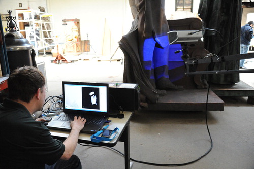Figure 5. Sean Belshaw from Applied Precision performing 3D scanning of the sculpture.