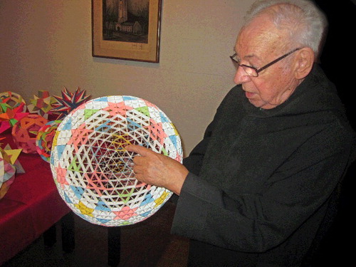 Figure 1. Magnus J. Wenninger with a geodesic sphere model.