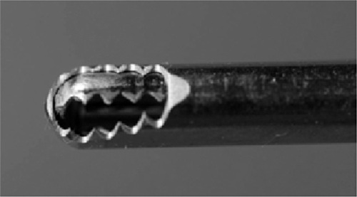 Figure 1 Distal end of powered cutting instrument (see text for details).