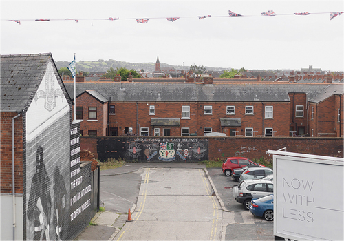 Figure 7. The rear aspect of dwellings from an early 1980s cul-de-sac development in east Belfast, crudely placed on top of a former through-street. Photograph: Donovan Wylie.