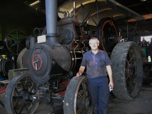 Figure 8. Steve Deacon with the steam traction engine that he fitted with new gears so that he could run the machine without going deaf. Campbelltown Steam and Machinery Museum. Image: Wain 2008.