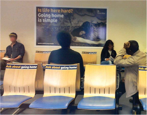 Figure 2. Shows an image taken from within the reporting centre in Glasgow – the chairs and walls have been canvassed with material convincing those reporting to enquire about ‘going home’ (credit Robert Perry).