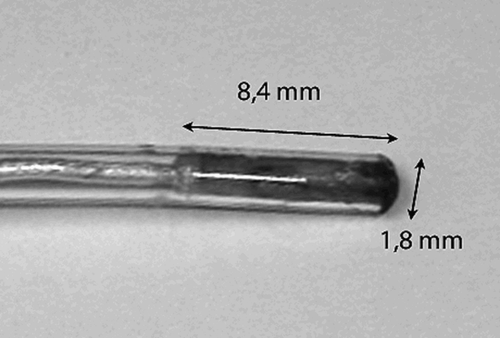 Figure 2. The microsensors have a diameter of approximately 1.8 mm and a length of approximately 8.4 mm including the sterilizable capsule.