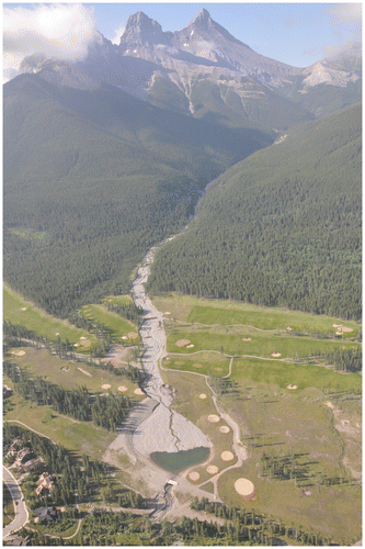 Figure 4. Debris flood deposit and erosion on Three Sisters Creek, Canmore, from the 19–21 June 2013 storm over southeastern Alberta. Photo by Matthias Jakob.