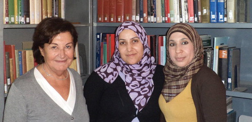 Ghazwa Malhas (left) and library assistants Rudaina Momani (centre, now British Institute librarian) and Muna Slaihat in the British Institute in Amman Library, summer 2012