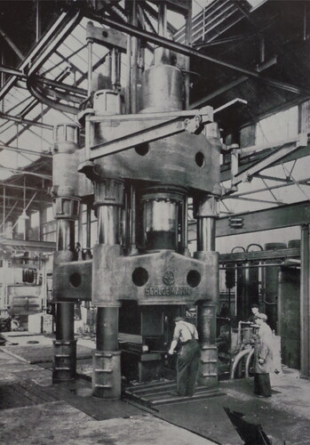 Figure 4. A 3000-ton pressure four-column hydraulic press at High Duty Alloys Ltd, Slough, making propeller blade blanks. The Schloemann press was one of many items of German equipment supplied to the British light alloy industry before WW2. (From Aircraft Production April 1939, figure 22, British Library copyright).