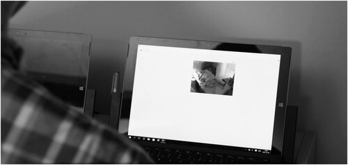 Figure 1. An operator remotely monitors an older person sleeping at home by using a non-infrared camera, during the pilot study.