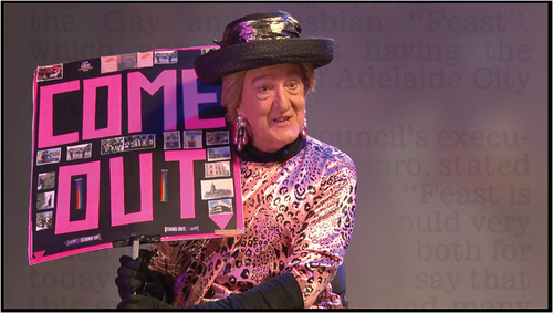 Figure 5. Gertrude Glossip and her iconic ‘COME OUT’ sign in feast: 25 Years, which featured in her history walks (source: Munro Citation2022).